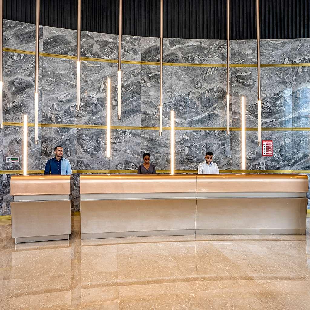 The First Collection Dubai Business Bay酒店 内观 照片 Reception desk