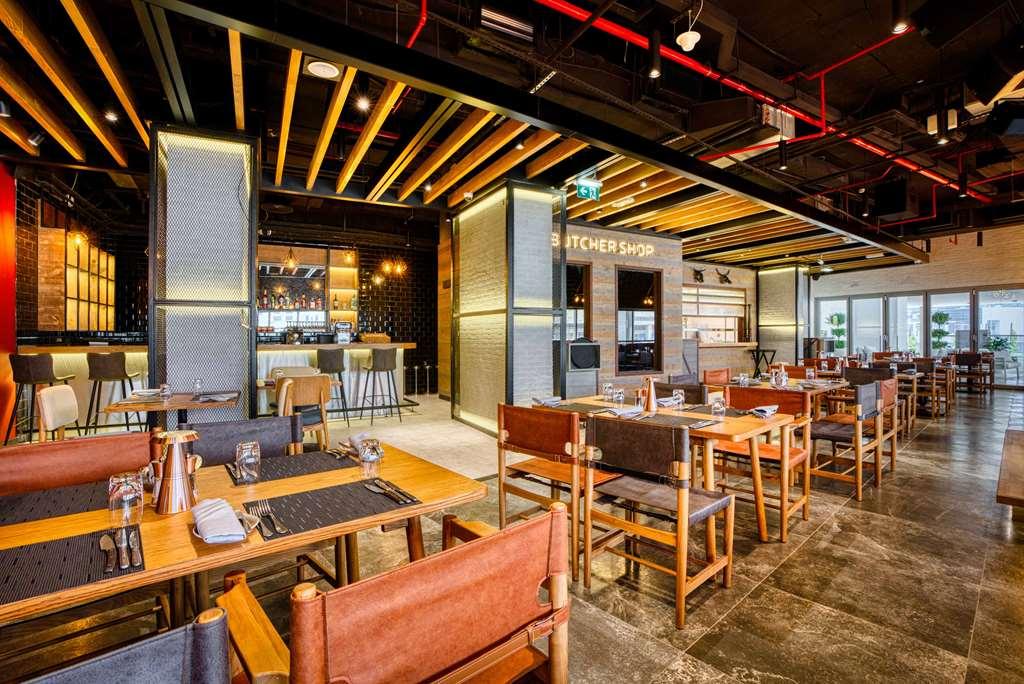 The First Collection Dubai Business Bay酒店 餐厅 照片 Interior of the restaurant